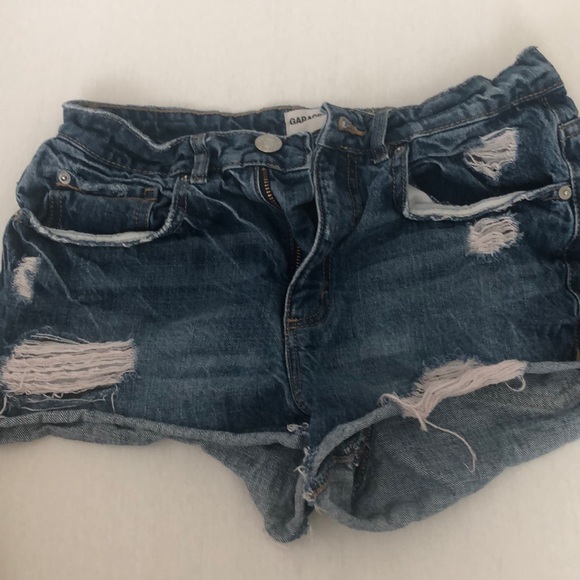 dark denim distressed shorts